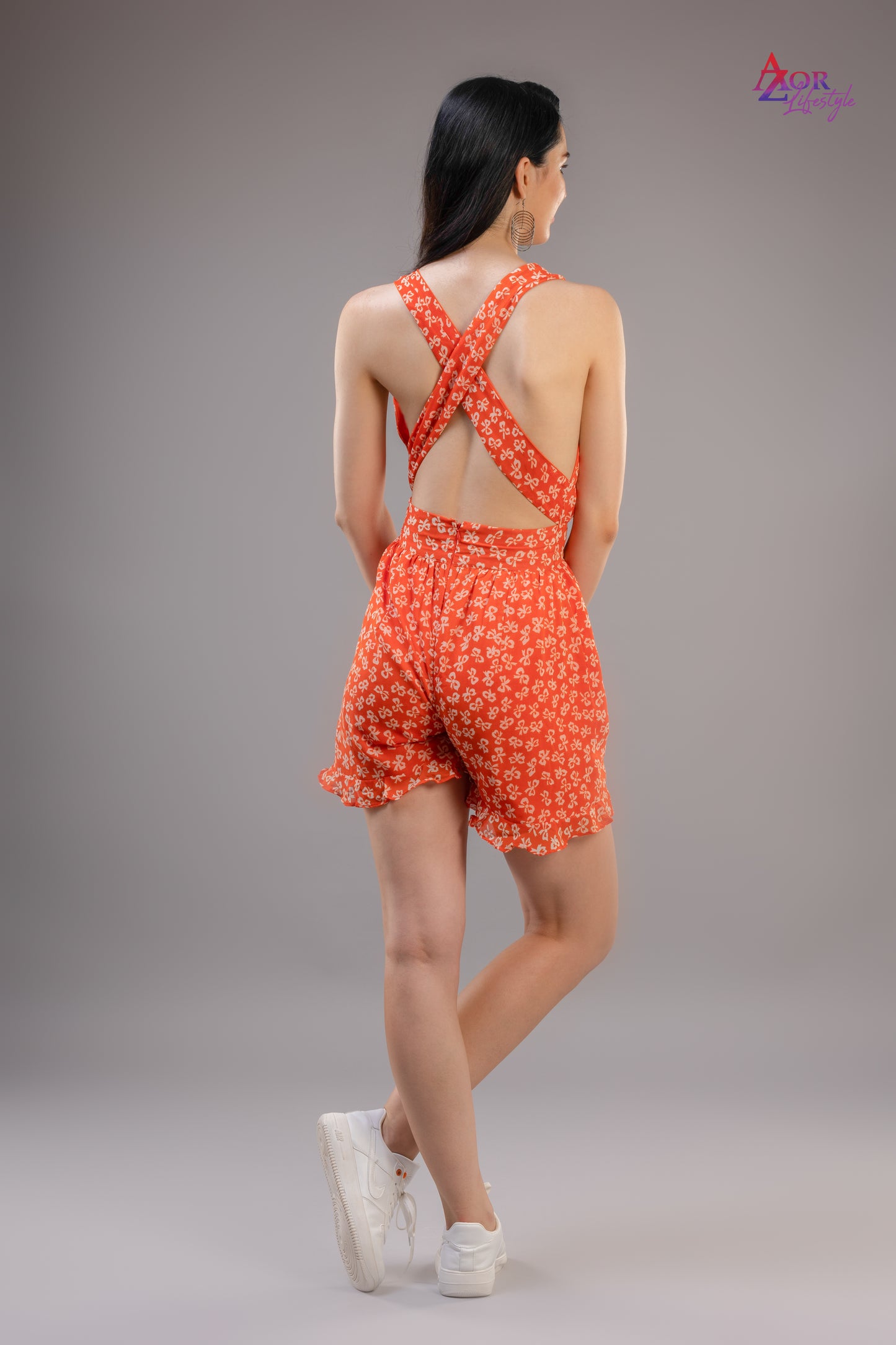 Women orange cross back romper