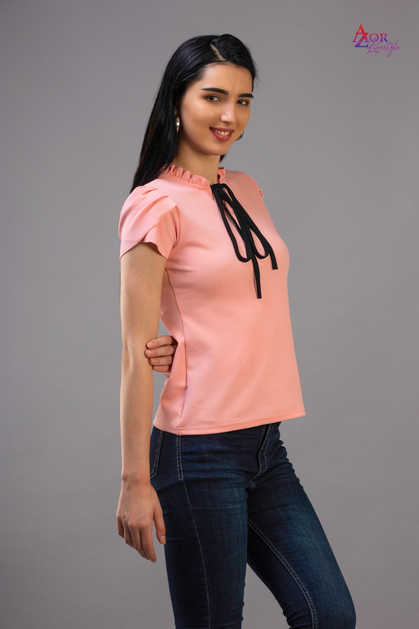 Women pink top with tie