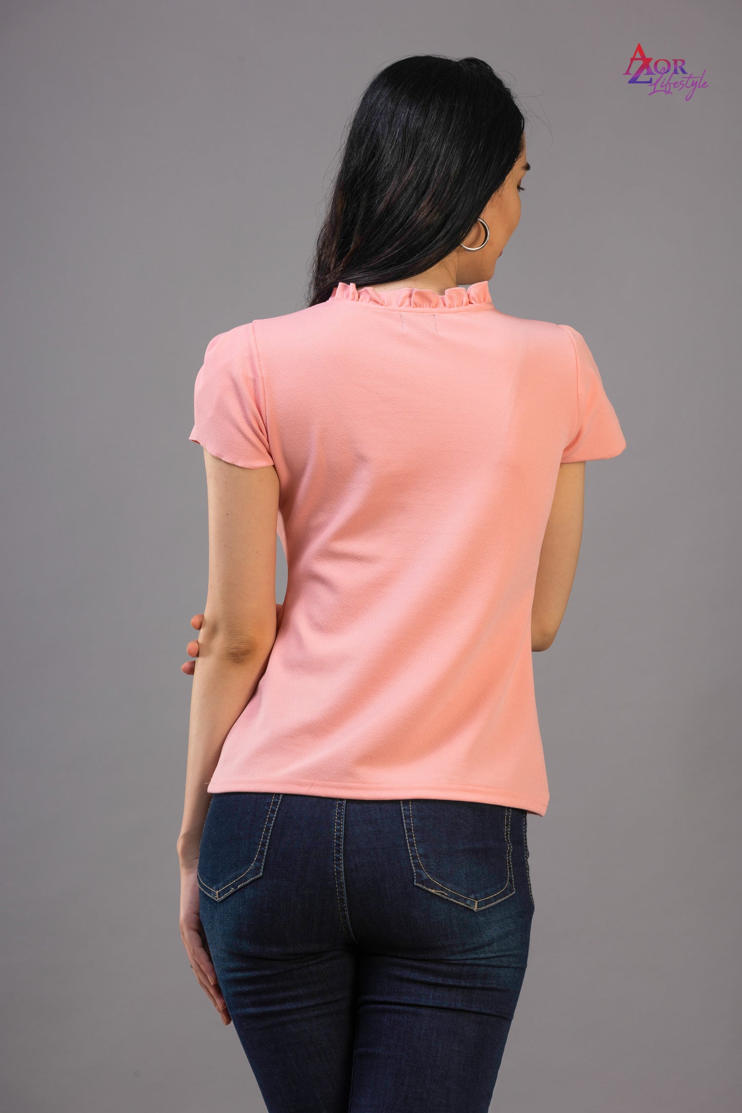 Women pink top with tie